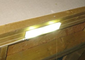 lit and fitted LED
lamp on garage ceiling